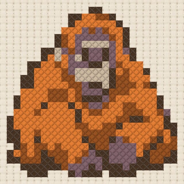 Orangutan finished in cross stitch on Aida cloth