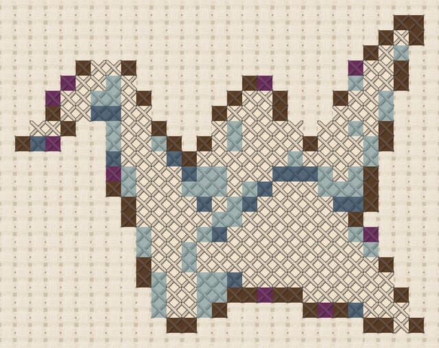 Origami crane finished in cross stitch on Aida cloth