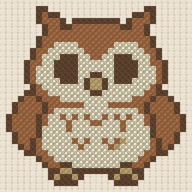 Owl finished in cross stitch on Aida cloth