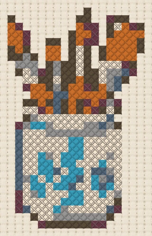 Paintbrush jar finished in cross stitch on Aida cloth