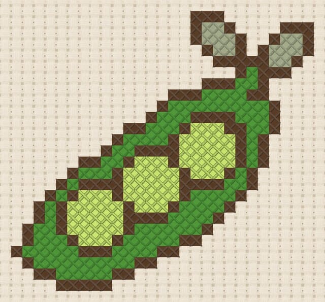 Pea pod finished in cross stitch on Aida cloth