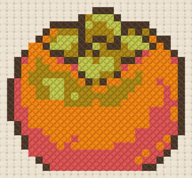 Persimmon finished in cross stitch on Aida cloth