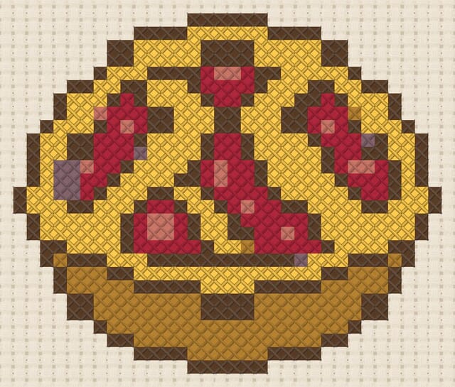 Cherry pie finished in cross stitch on Aida cloth