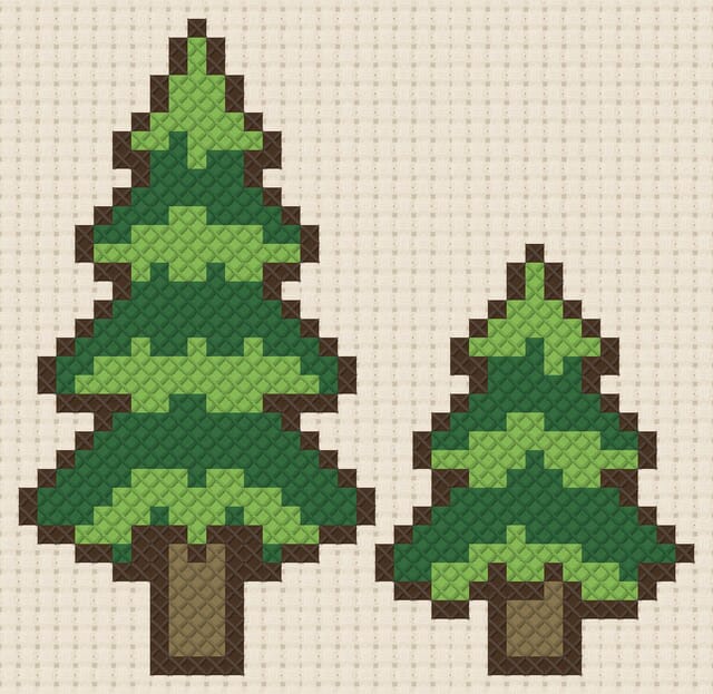 Pine trees finished in cross stitch on Aida cloth