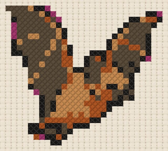 Pipistrelle bat finished in cross stitch on Aida cloth