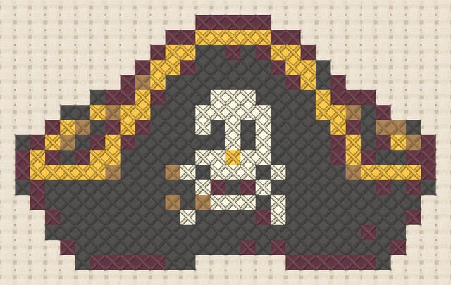 Pirate hat finished in cross stitch on Aida cloth