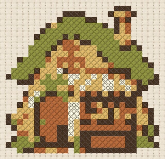 Pixie bakery finished in cross stitch on Aida cloth