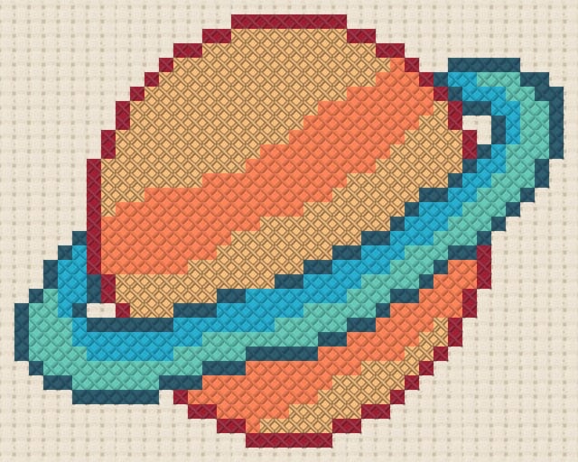 Planet with rings finished in cross stitch on Aida cloth
