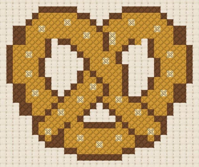 Pretzel finished in cross stitch on Aida cloth