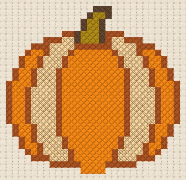 Pumpkin finished in cross stitch on Aida cloth