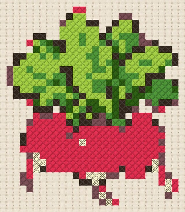 Radishes finished in cross stitch on Aida cloth