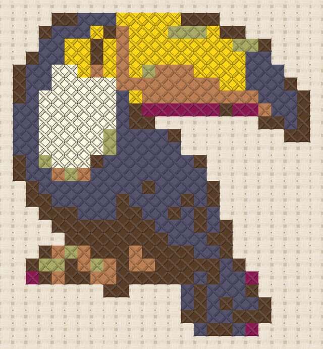 Rainbow toucan finished in cross stitch on Aida cloth