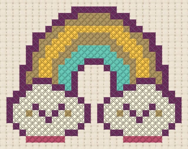 Rainbow finished in cross stitch on Aida cloth