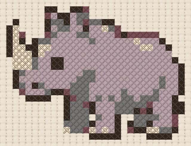 Rhinoceros finished in cross stitch on Aida cloth