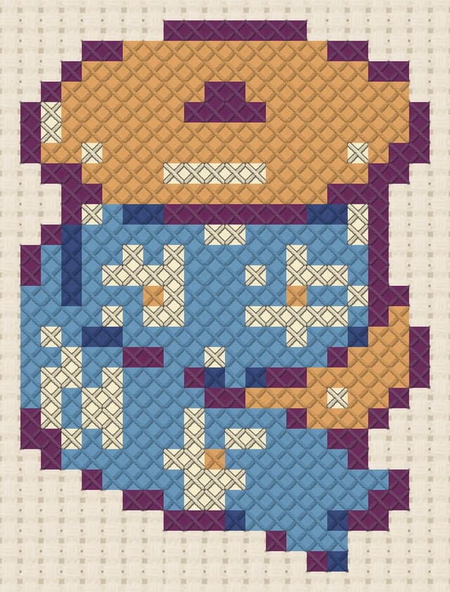 Ribbon reel finished in cross stitch on Aida cloth