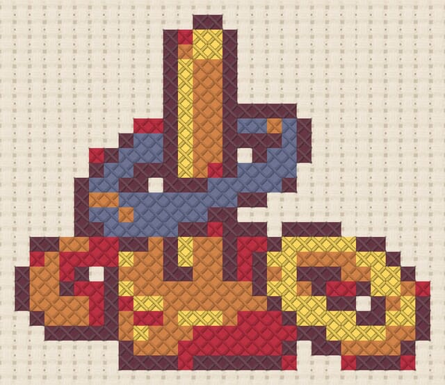 Ring toss finished in cross stitch on Aida cloth