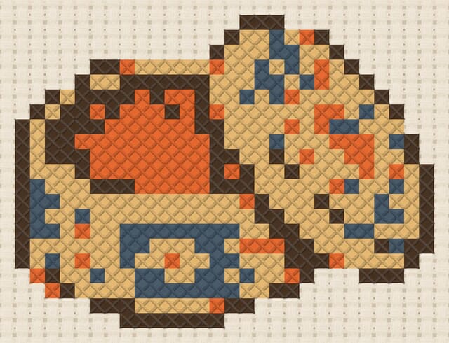 Saffron tin finished in cross stitch on Aida cloth