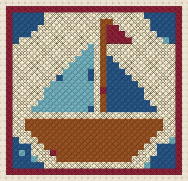 Sailboat quilt block finished in cross stitch on Aida cloth