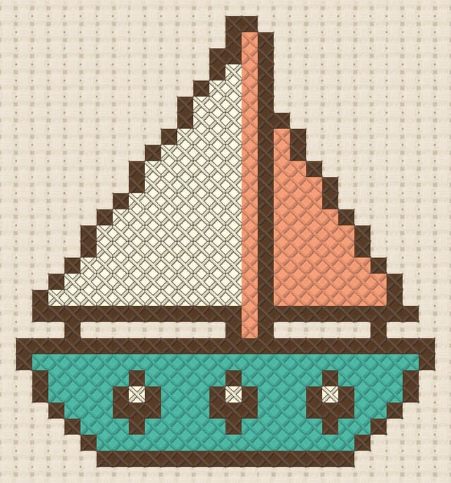 Sailboat finished in cross stitch on Aida cloth