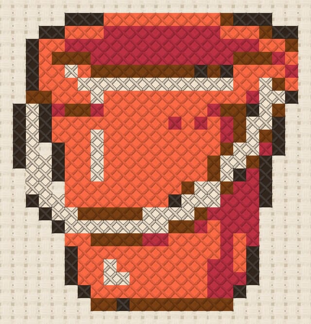 Sand bucket finished in cross stitch on Aida cloth