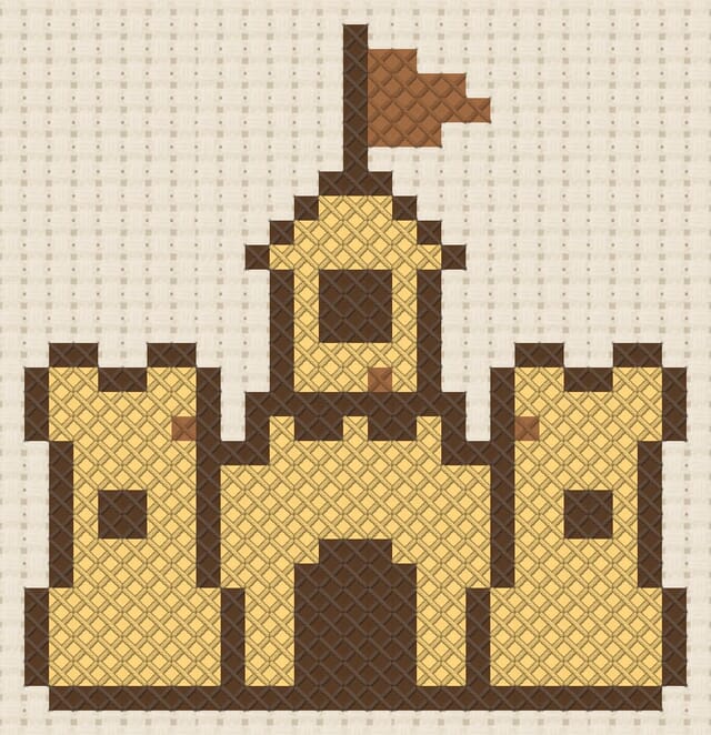Sandcastle finished in cross stitch on Aida cloth
