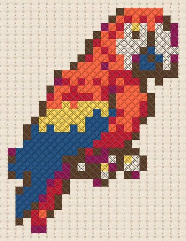 Scarlet macaw finished in cross stitch on Aida cloth