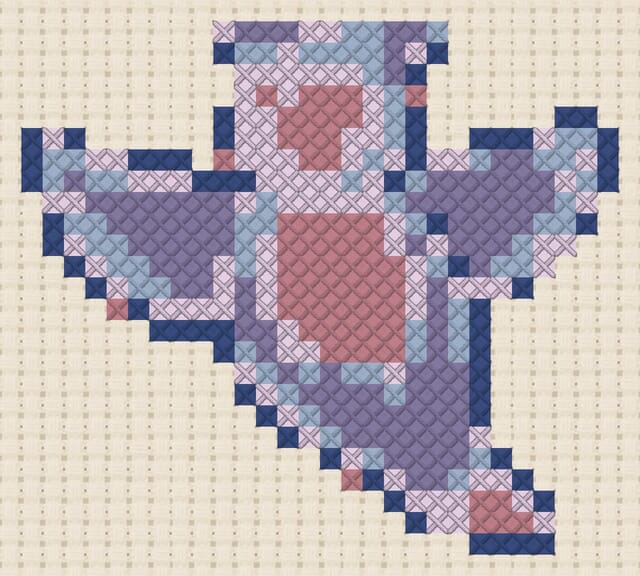 Sea angel finished in cross stitch on Aida cloth
