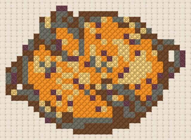 Seafood paella finished in cross stitch on Aida cloth