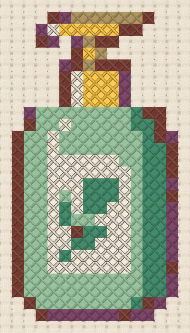 Shampoo bottle finished in cross stitch on Aida cloth