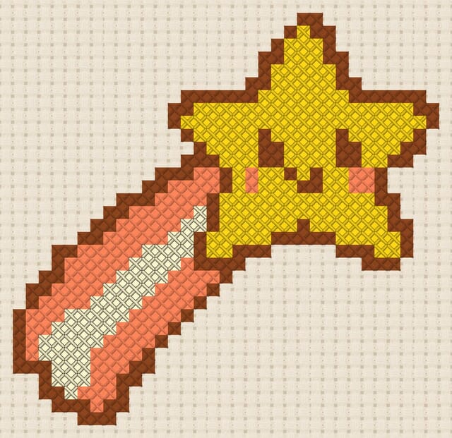 Shooting star finished in cross stitch on Aida cloth