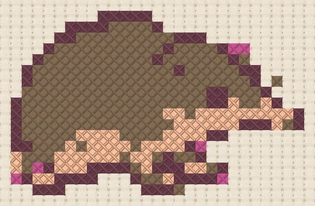 Shrew finished in cross stitch on Aida cloth