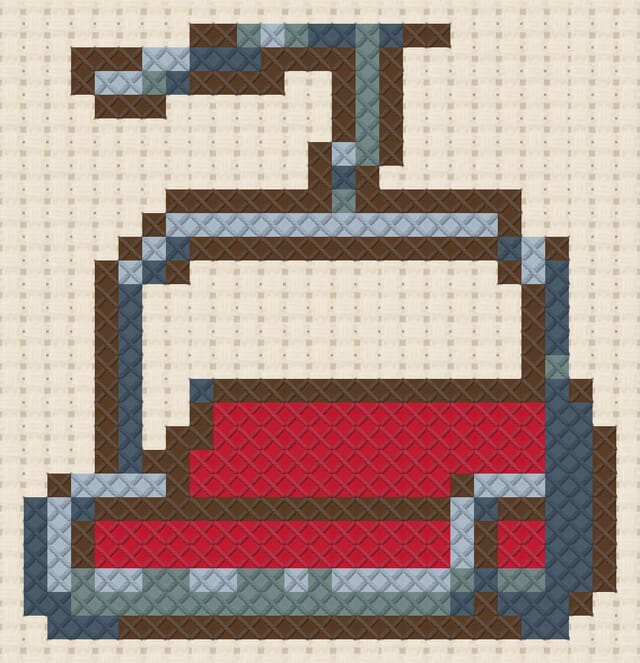 Ski lift chair finished in cross stitch on Aida cloth