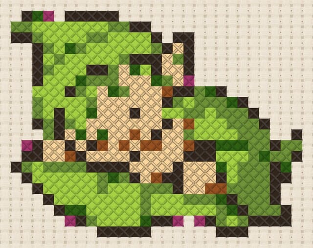 Sleeping sprite finished in cross stitch on Aida cloth
