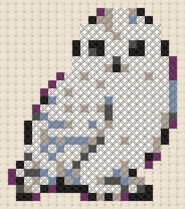 Snowy owl finished in cross stitch on Aida cloth