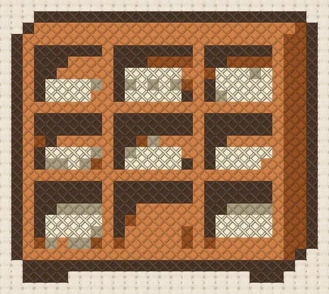Sorting cubby finished in cross stitch on Aida cloth