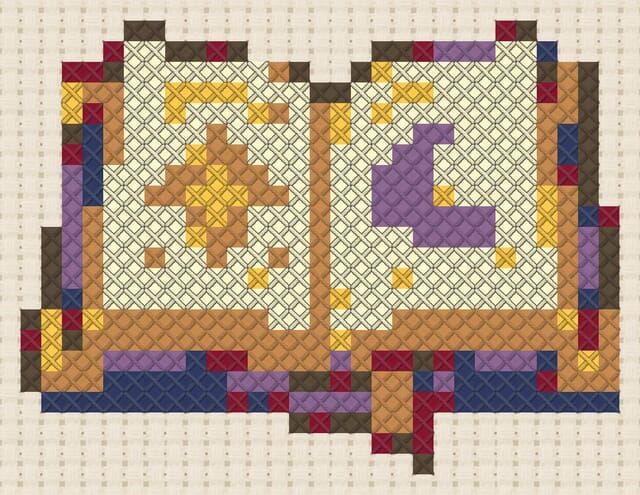 Spellbook finished in cross stitch on Aida cloth