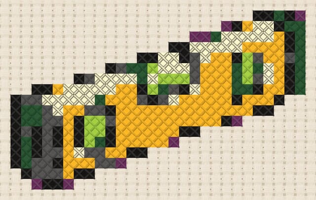 Spirit level finished in cross stitch on Aida cloth