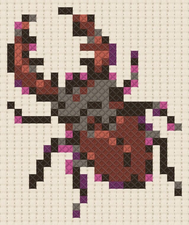 Stag beetle finished in cross stitch on Aida cloth