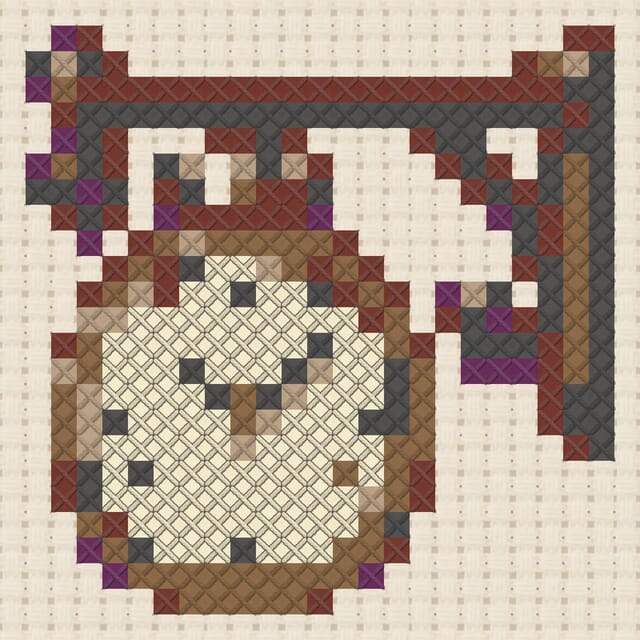 Station clock finished in cross stitch on Aida cloth