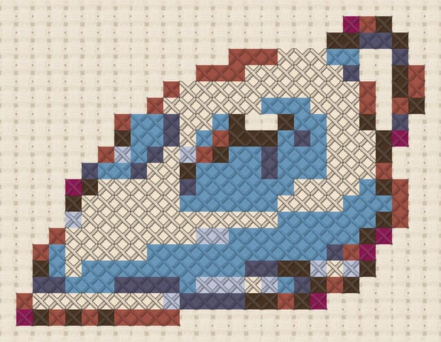 Steam iron finished in cross stitch on Aida cloth