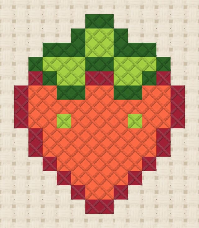 Strawberry finished in cross stitch on Aida cloth