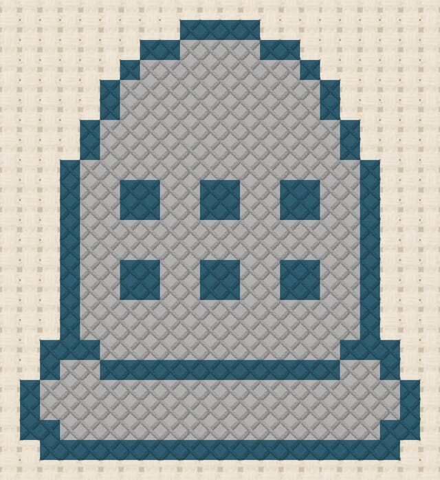 Thimble finished in cross stitch on Aida cloth