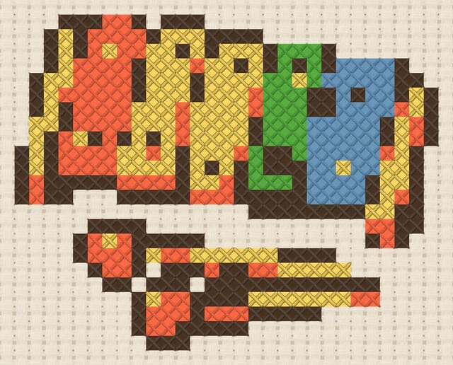 Toy xylophone finished in cross stitch on Aida cloth