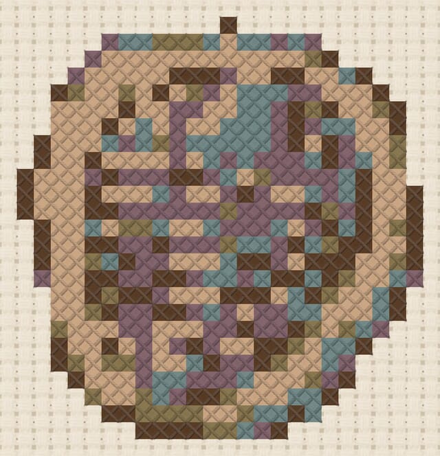 Trilobite fossil finished in cross stitch on Aida cloth