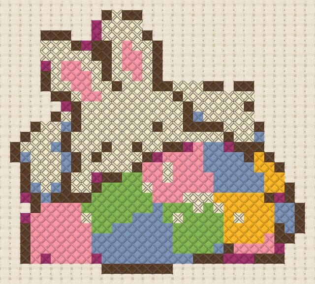Tucked-in bunny finished in cross stitch on Aida cloth