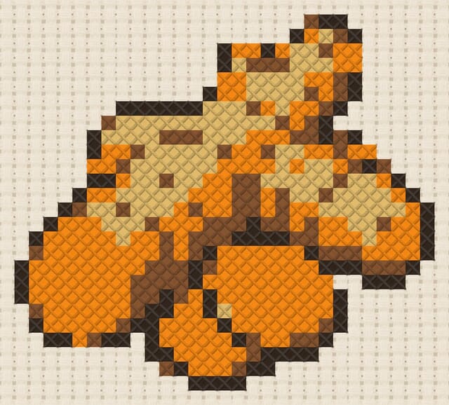 Turmeric root finished in cross stitch on Aida cloth