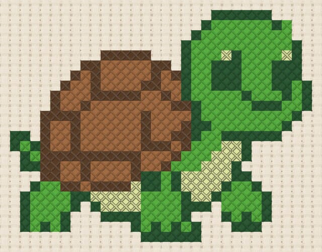 Turtle finished in cross stitch on Aida cloth