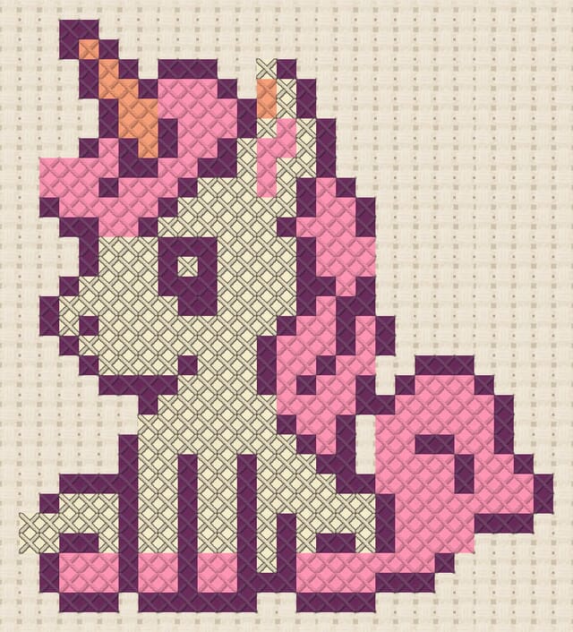 Unicorn finished in cross stitch on Aida cloth