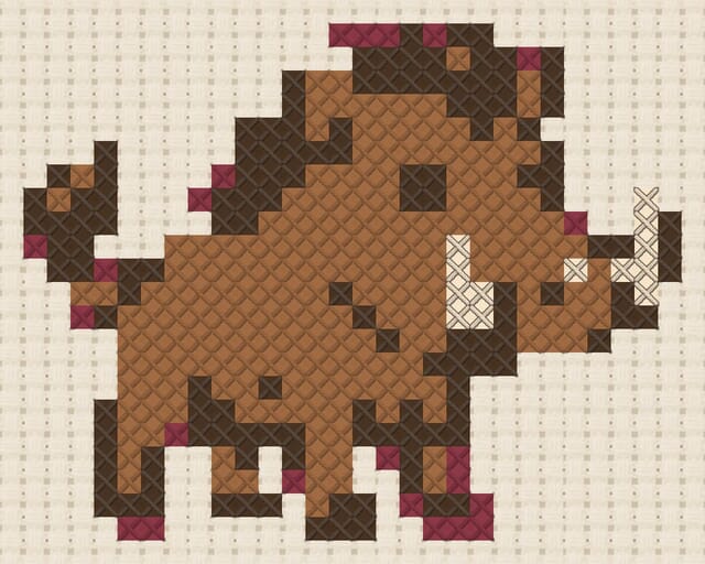 Warthog finished in cross stitch on Aida cloth