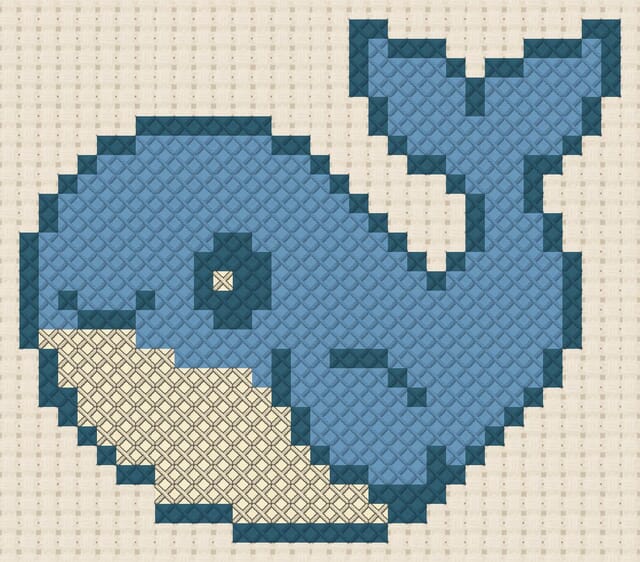 Whale finished in cross stitch on Aida cloth